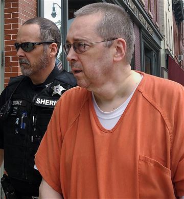 The Rev. David Lee Poulson is led into the courtroom in Brookville, Pennsylvania, on May 31, 2018.Madeleine O'Neill / Erie Times-News via AP